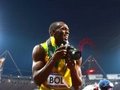 Usain Bolt po zdobyciu złotego medalu zabrał fotografowi lustrzankę i sam zaczął robić zdjęcia