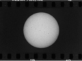 ISS na tle tarczy słonecznej na filmie 35 mm